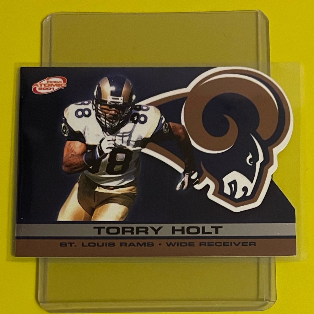 Torry Holt #120 2001 Pacific Prism Atomic Football Trading Card